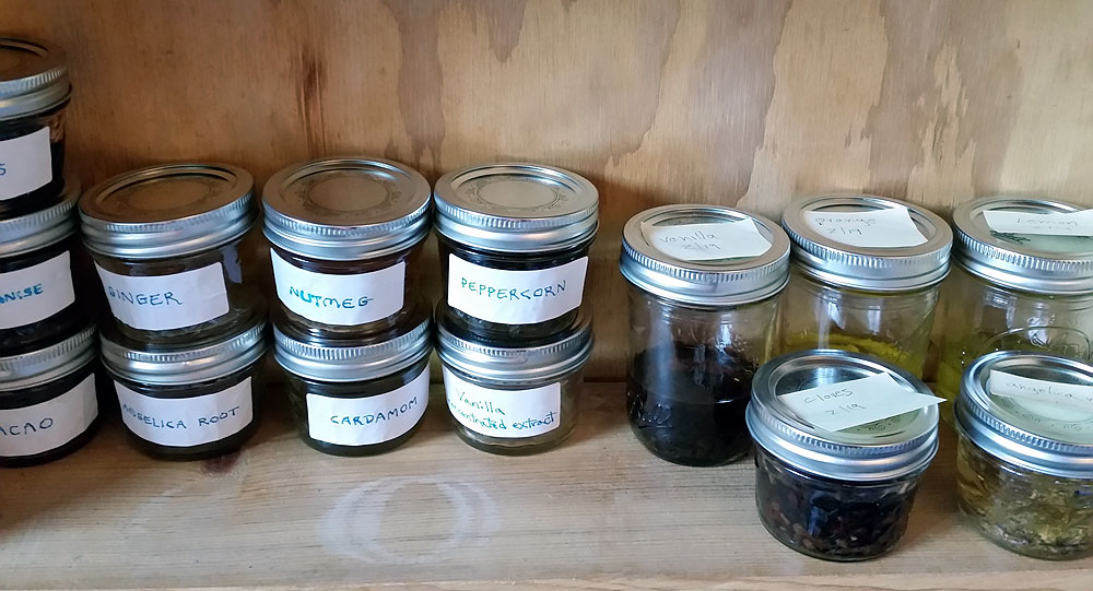 Tinctures. At right are infusions in process, at left completed, strained tinctures.