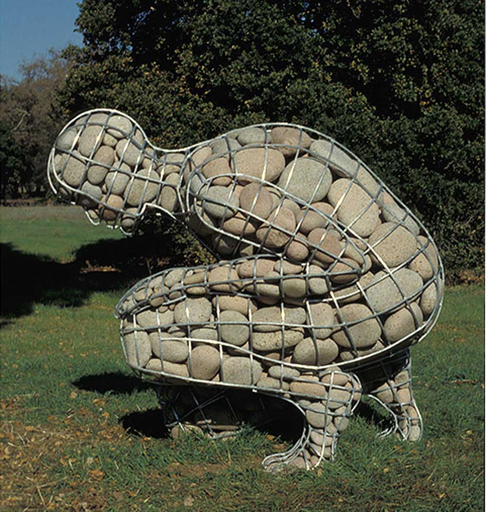 <em>Rising Cairn</em>, by <a href="http://www.celesteroberge.com/w-cairn-rising.php">Celeste Roberge</a>. Welded galvanized steel and granite, 58" x 54" x 43". Collection: Runnymede Sculpture Farm, Woodside, California.